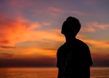 Man silhouette on beautiful sunset